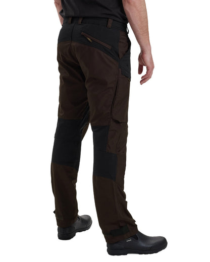 Dark Prune coloured Deerhunter Strike Trousers on white background #colour_dark-prune