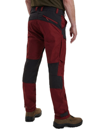 Oxblood Red coloured Deerhunter Strike Trousers on white background #colour_oxblood-red