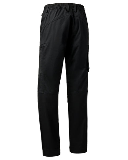 Black coloured Deerhunter Traveler Trousers on white background #colour_black