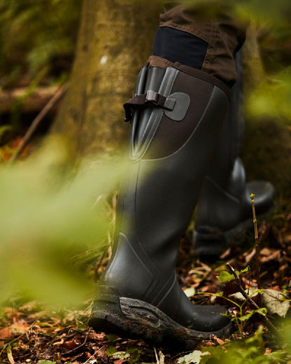 Dark Brown Coloured Gateway1 Moor Country 18" 3mm Side-Zip Wellingtons on outdoor background #colour_dark-brown