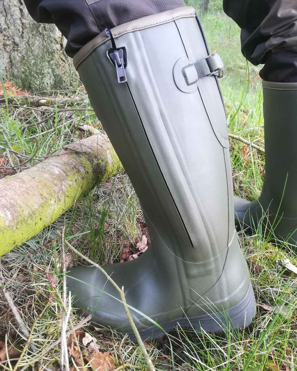 Dark Olive coloured Gateway1 Pheasant Game 18" 5mm Side-Zip Wellingtons on Field background #colour_dark-olive