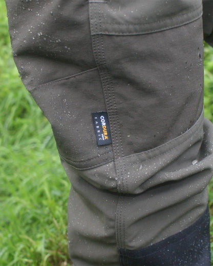 Forest Shade Coloured Harehill Waterproof Ridgegate Trousers on outdoor background #colour_forest shade