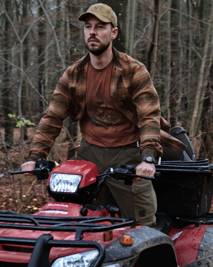 Autumn Orange Check coloured Harkila Aivak Long Sleeved Shirt on forest background #colour_autumn-orange-check