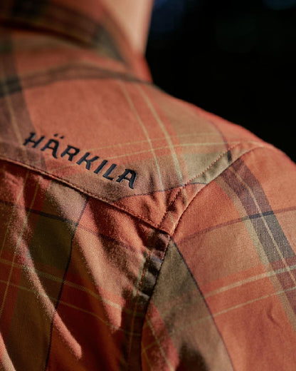 Arabian Spice Coloured Harkila Anker Long Sleeve Shirt on outdoor background #colour_arabian-spice