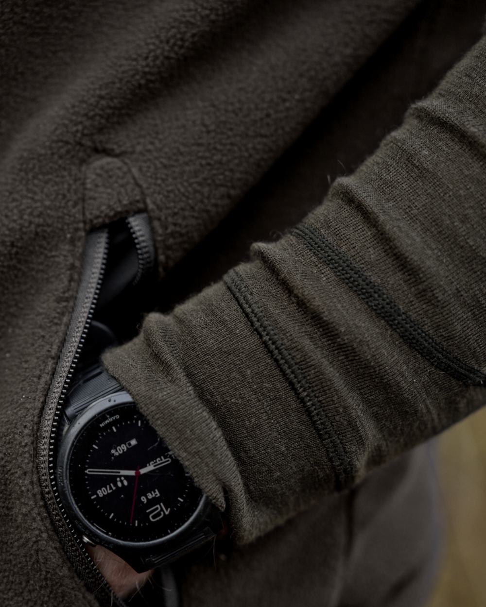 Shadow Brown Coloured Harkila Aspire Fleece Waistcoat on outdoor background #colour_shadow-brown