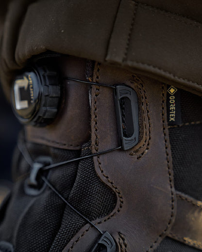 Dark Brown Coloured Harkila Atammik GTX Waterproof Boots on outdoor background #colour_dark-brown