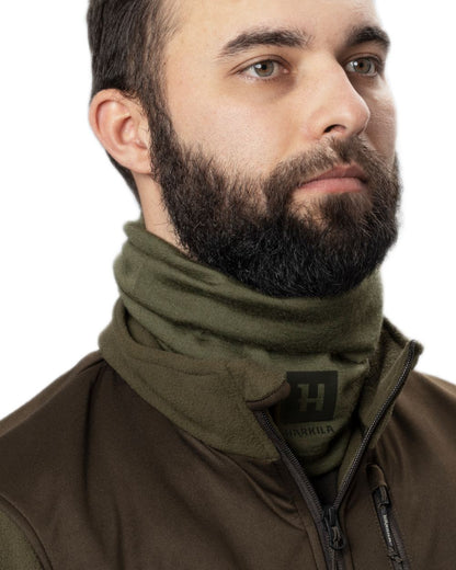 Dark Olive Coloured Harkila Base All Season Tubular Limited Edition on white background #colour_dark-olive