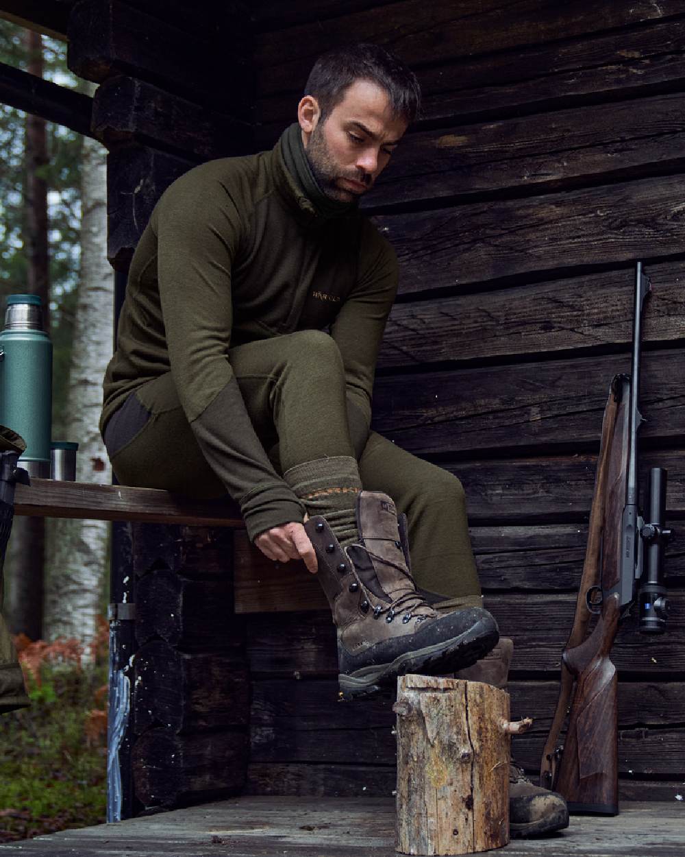 Willow Green Shadow Brown Coloured Harkila Base Warm Zip Neck on countryside background #colour_willow-green-shadow-brown