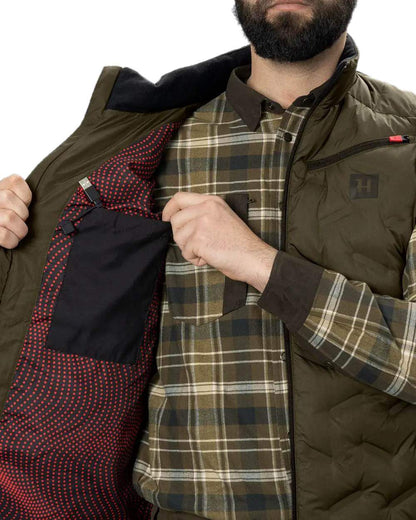 Willow Green Coloured Harkila Clim8 Insulated Waistcoat on white background #colour_willow-green