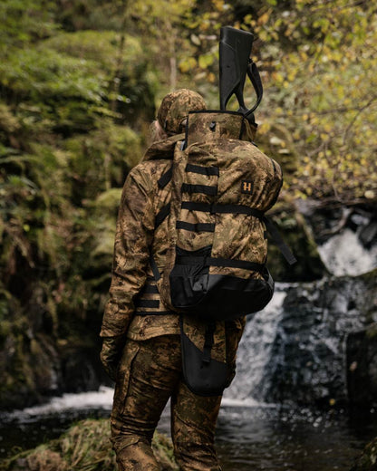 Axis MSP Forest Coloured Harkila Deer Stalker Backpack on outdoor background #colour_axis-msp-forest