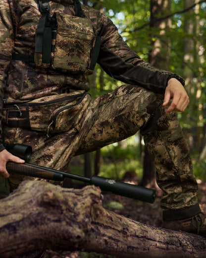 AXIS Forest Coloured Harkila Deer Stalker Camo Light Trousers on outdoor background #colour_axis-forest