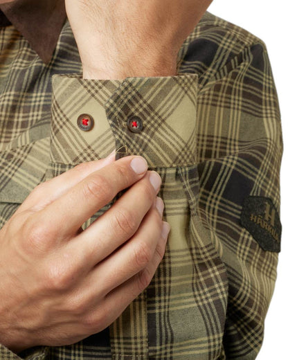 Light Teak Check coloured Harkila Driven Hunt Flannel Shirt on white background #colour_light-teak-check