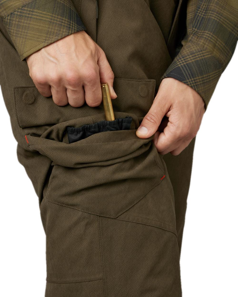 Willow Green Coloured Harkila Driven Hunt HWS Insulated Trousers on white background #colour_willow-green