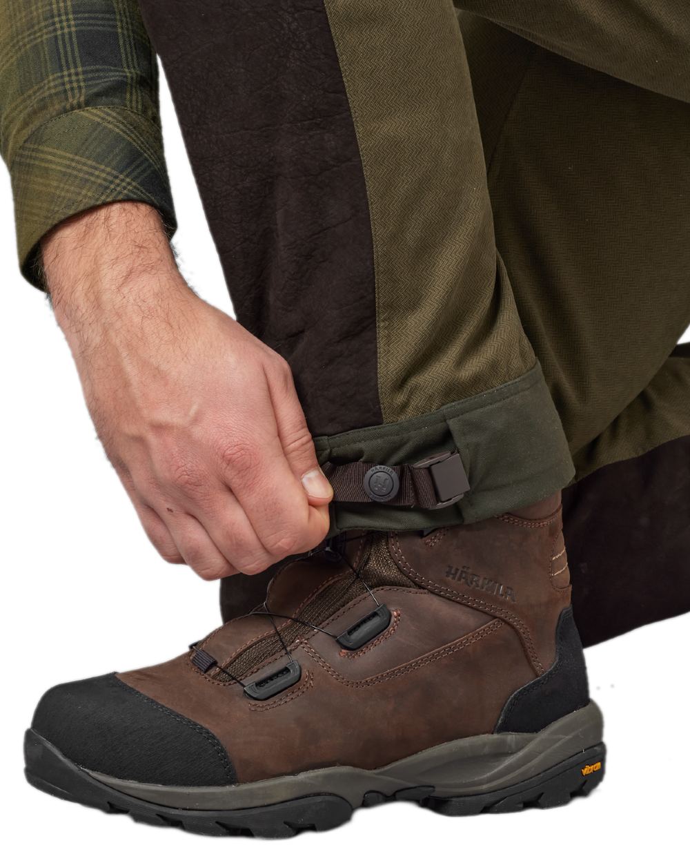 Willow Green Shadow Brown Coloured Harkila Driven Hunt HWS Leather Trousers on white background #colour_willow-green-shadow-brown