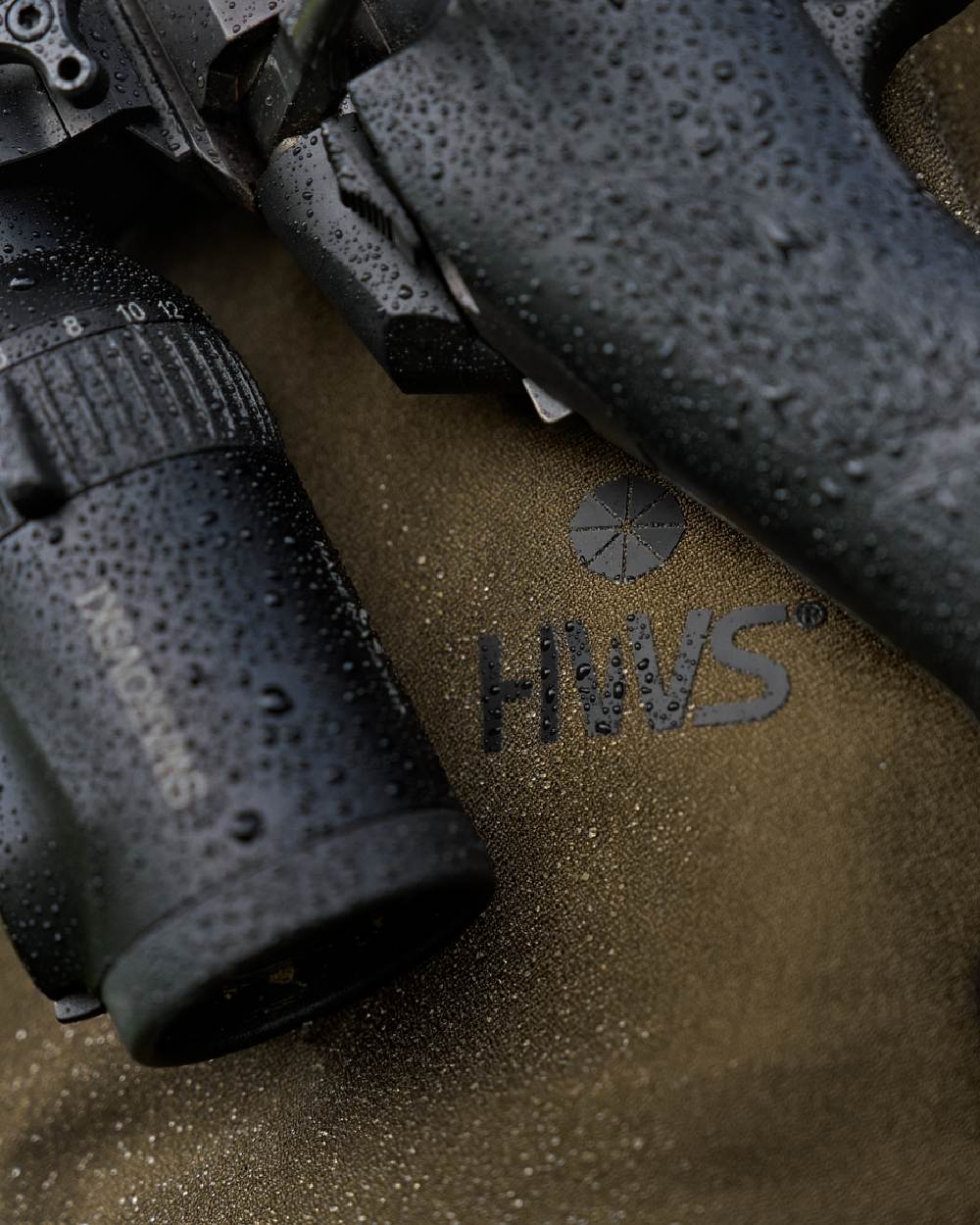 Hunting Green Coloured Harkila Finnmark HWS Trousers on blurry background #colour_hunting-green