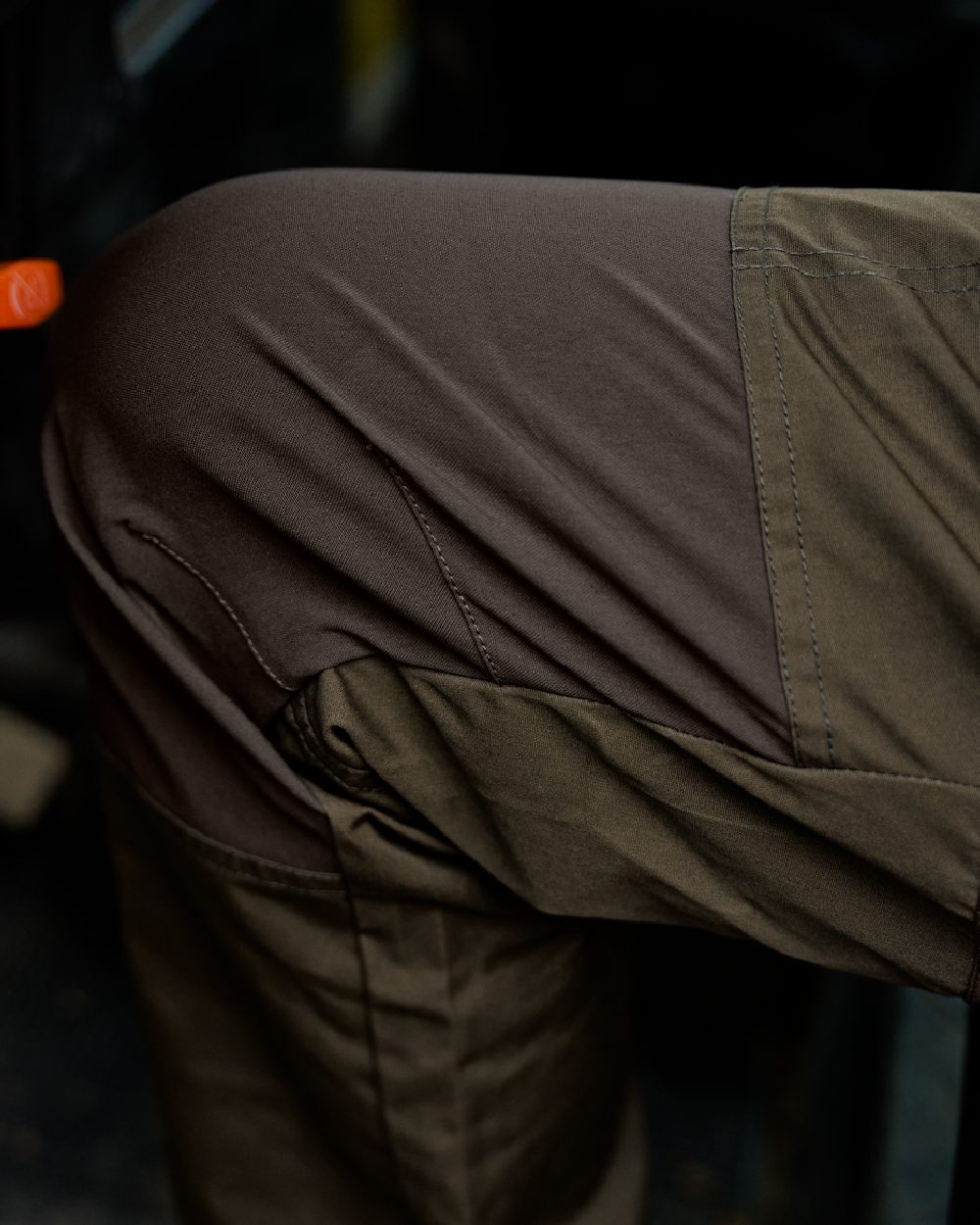 Willow Green Shadow Brown Coloured Harkila Fjell Trousers on blurry background #colour_willow-green-shadow-brown