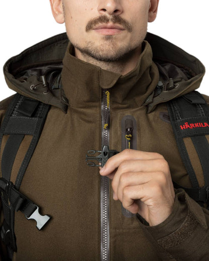 Hunting Green Coloured Harkila Forest Hunter Backpack on white background #colour_hunting-green