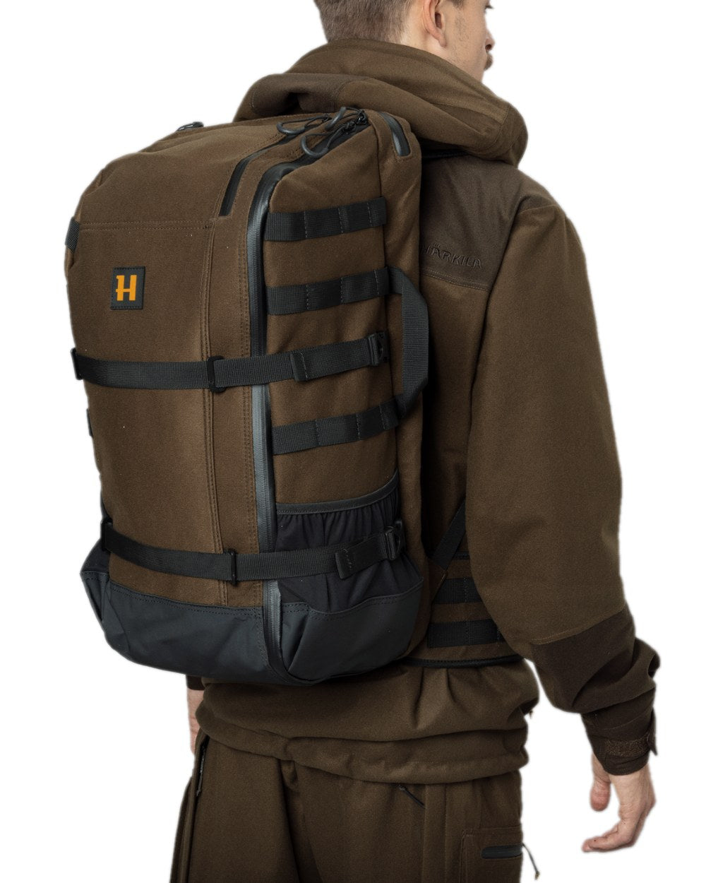 Hunting Green Coloured Harkila Forest Hunter Backpack on white background #colour_hunting-green