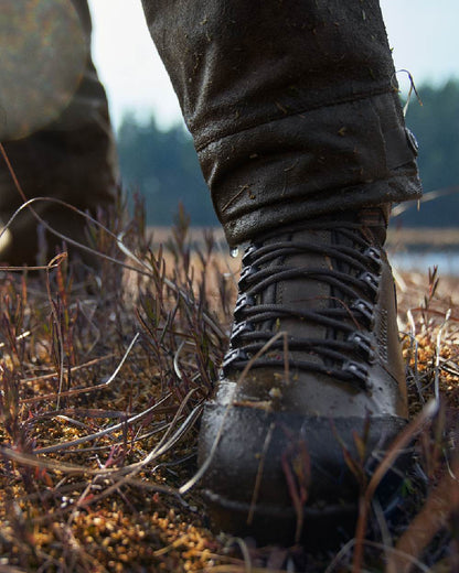 Willow Green Coloured Harkila Forest Hunter Hi GTX Boots on outdoor background #colour_willow-green