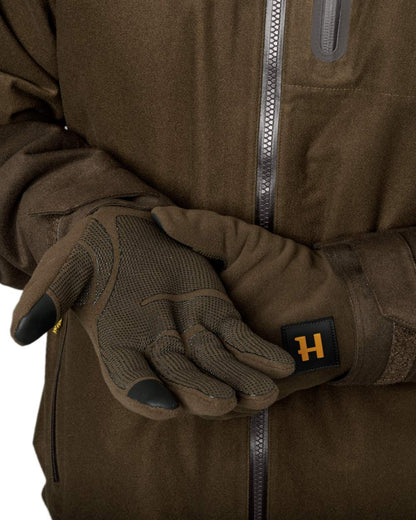 Hunting Green Shadow Brown Coloured Harkila Forest Hunter WSP Gloves on outdoor background #colour_hunting-green-shadow-brown