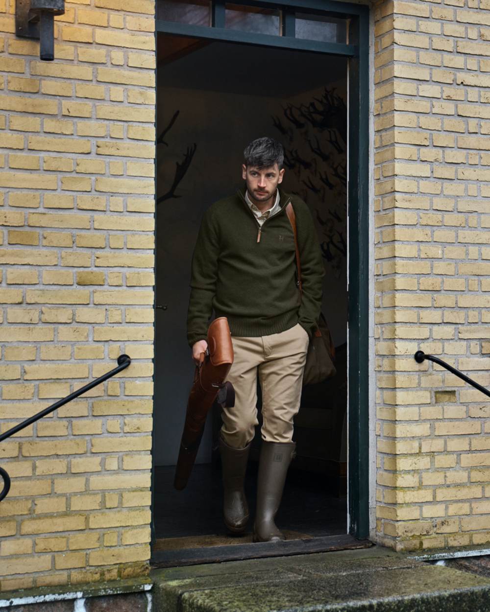 Dark Willow Green Coloured Harkila Forester Gusset Rubber Boots on outdoor background #colour_dark-willow-green