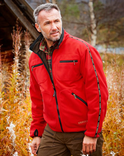 Brown Red Coloured Harkila Kamko Fleece on outdoor background #colour_brown-red