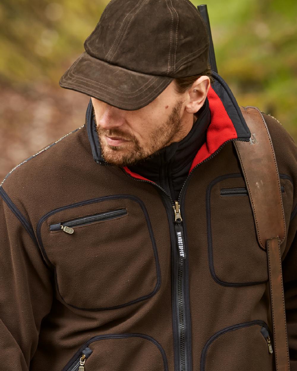 Brown Red Coloured Harkila Kamko Fleece on outdoor background #colour_brown-red