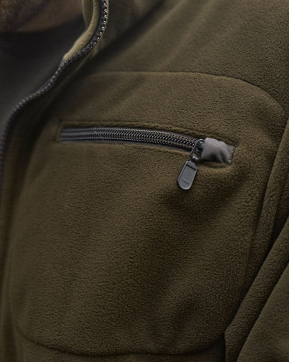 Dark Antique Bronze Willow Green Coloured Harkila Kamko Fleece on outdoor background #colour_dark-antique-bronze-willow-green