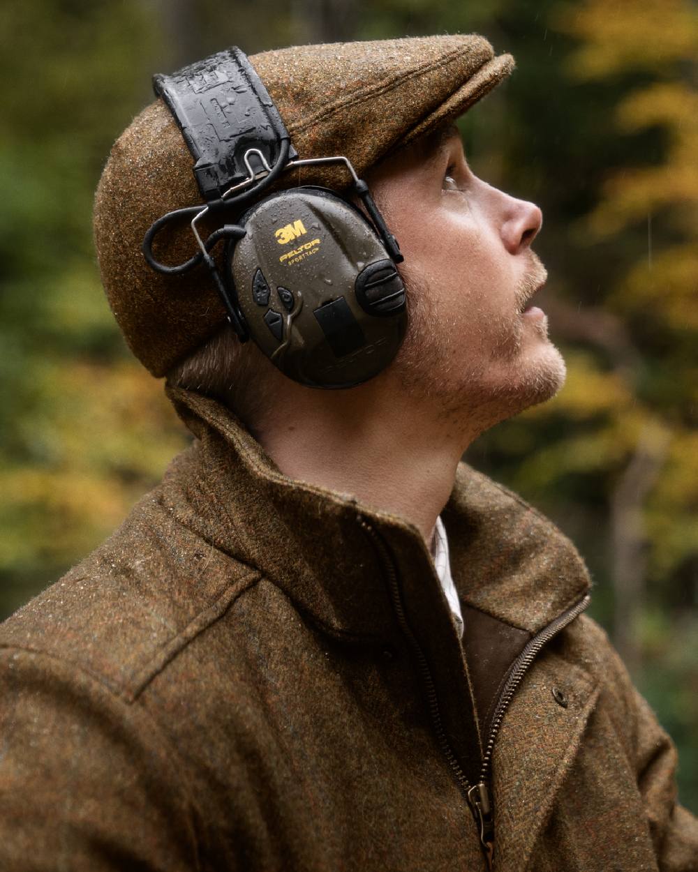 Terragon Brown Coloured Harkila Kenmore GTX Jacket on outdoor background #colour_terragon-brown