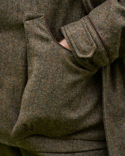 Forest Green Herringbone coloured Harkila Kenmore Shooting Waistcoat on white background #colour_forest-green-herringbone