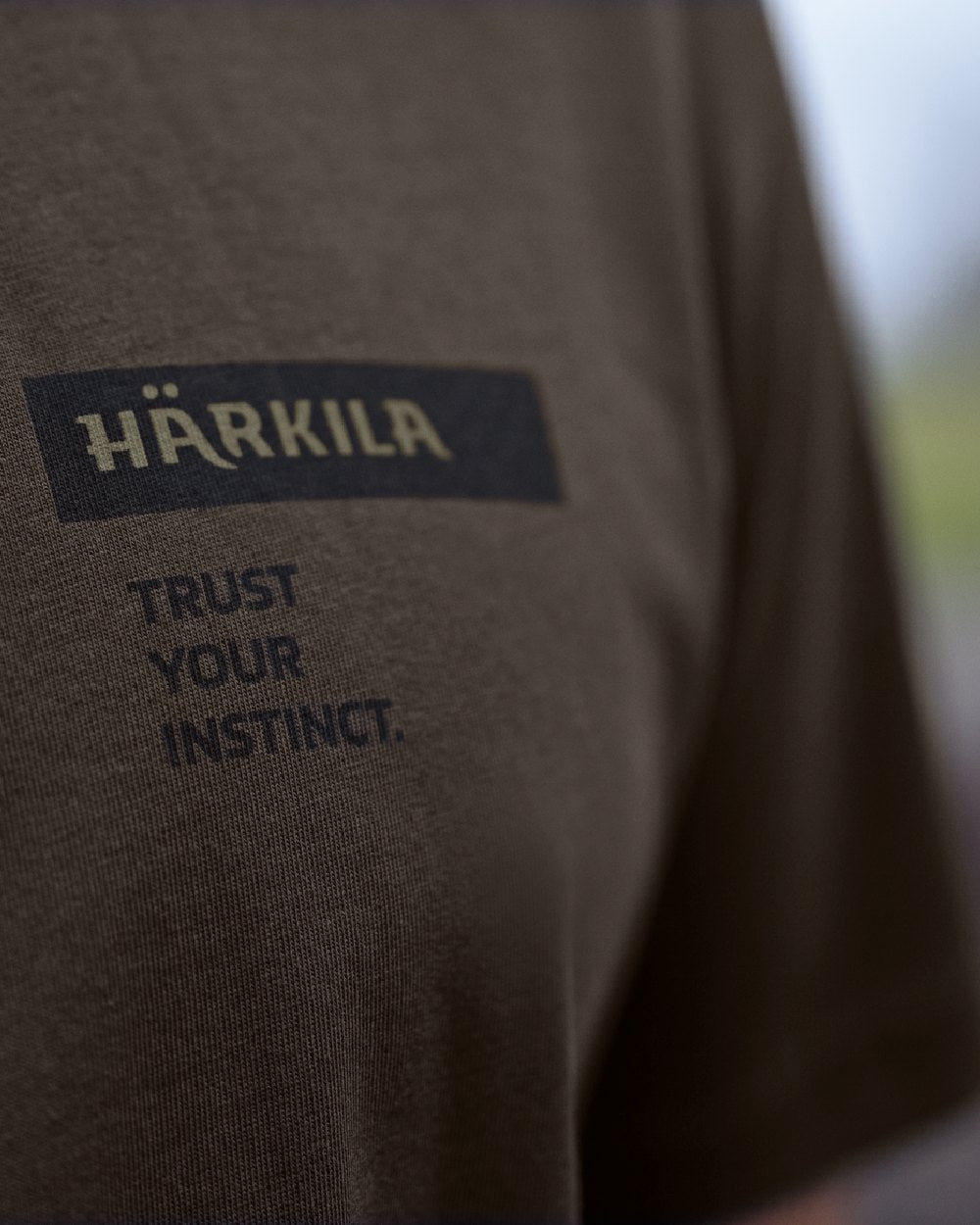 Anthractite/Sea Blue coloured Harkila Logo Band Short Sleeve T-Shirt on outdoor background #colour_anthracite-sea-blue