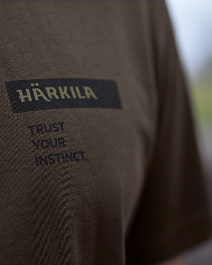 Anthractite/Sea Blue coloured Harkila Logo Band Short Sleeve T-Shirt on outdoor background #colour_anthracite-sea-blue