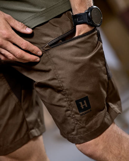 Dark Earth Shadow Brown Coloured Harkila Mens Fjell Shorts on studio background #colour_dark-earth-shadow-brown