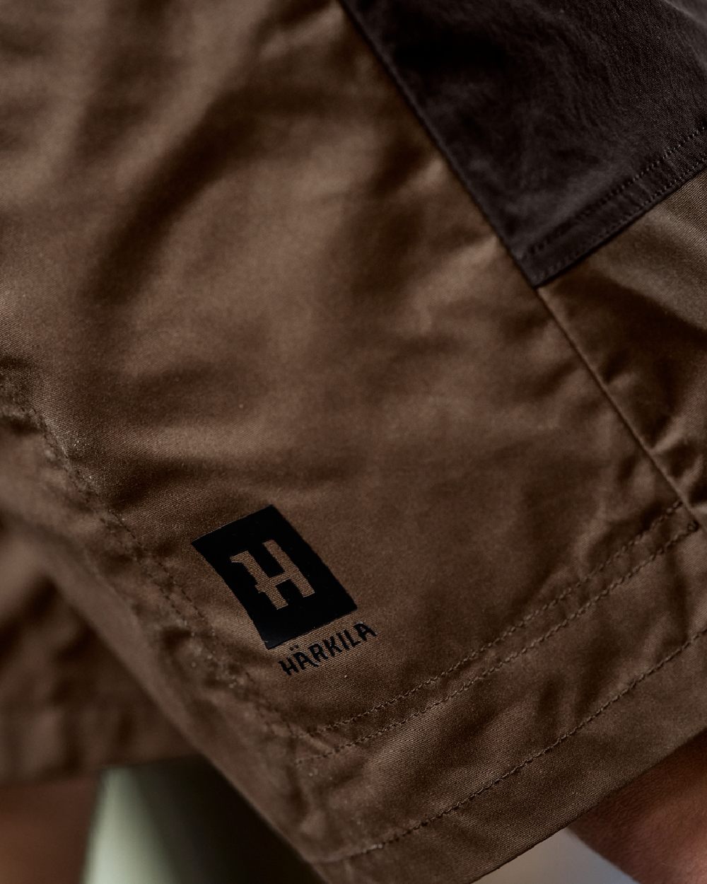 Dark Earth Shadow Brown Coloured Harkila Mens Fjell Shorts on studio background #colour_dark-earth-shadow-brown