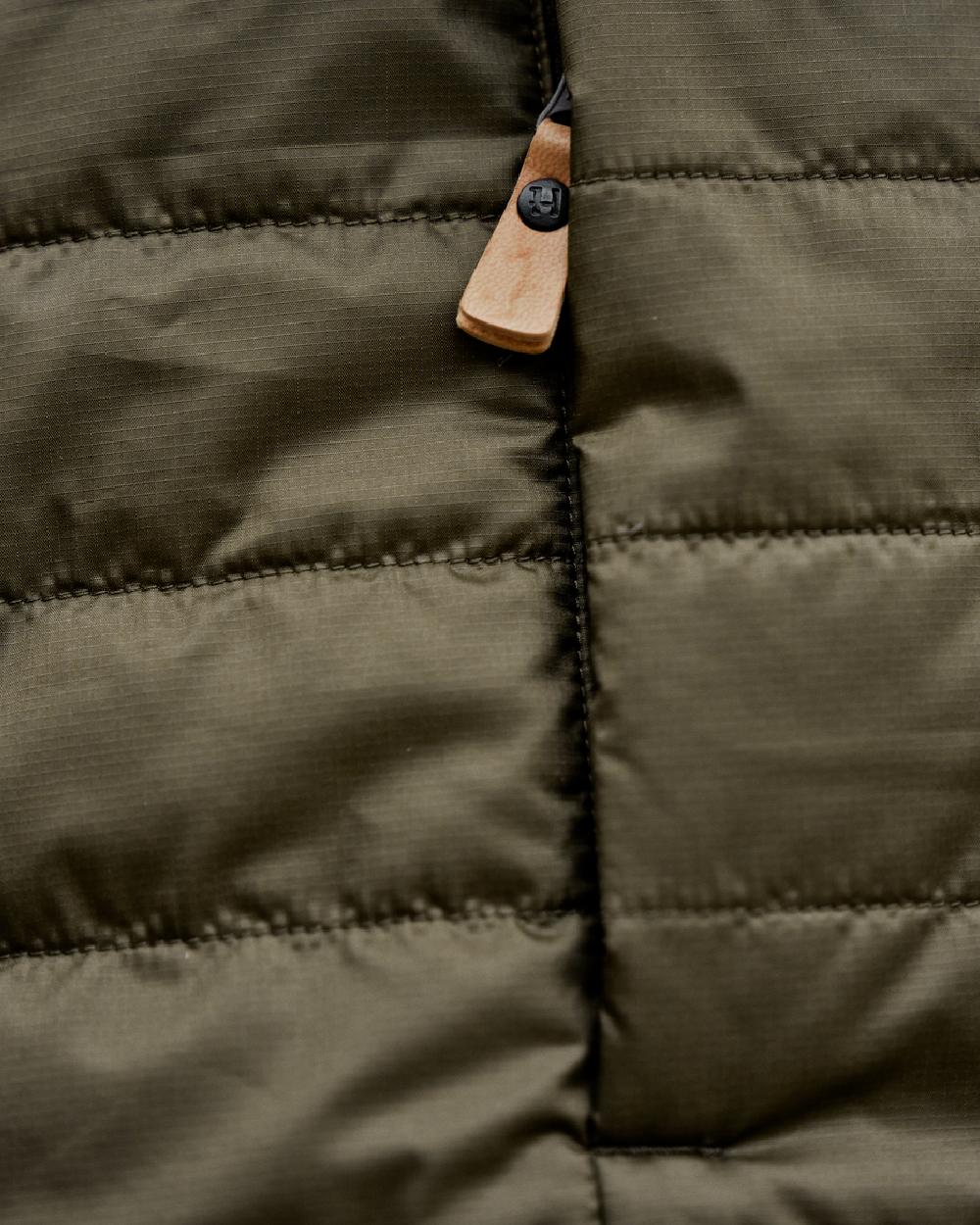 Willow Green Sea Blue Coloured Harkila Mens Kalix HSP Jacket on blurry background #colour_willow-green-sea-blue