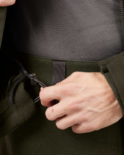 Willow Green Coloured Harkila Metso Hybrid Jacket on white background #colour_willow-green