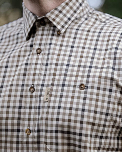 Blue Beige Check Coloured Harkila Milford Shirt on outdoor background #colour_blue-beige-check