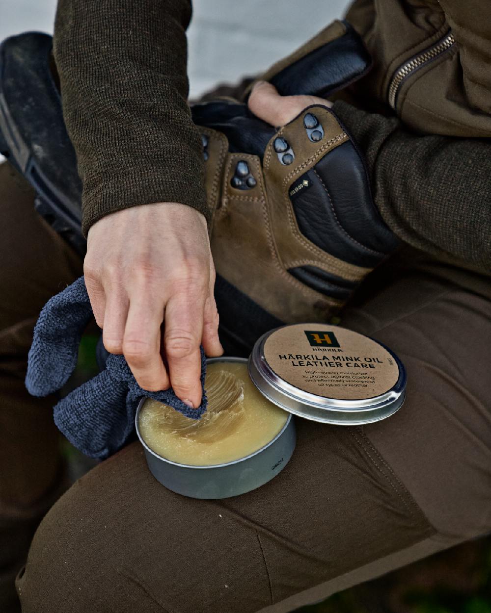 Neutral Coloured Harkila Mink Oil Leather Care 170 ml on outdoor background #colour_neutral