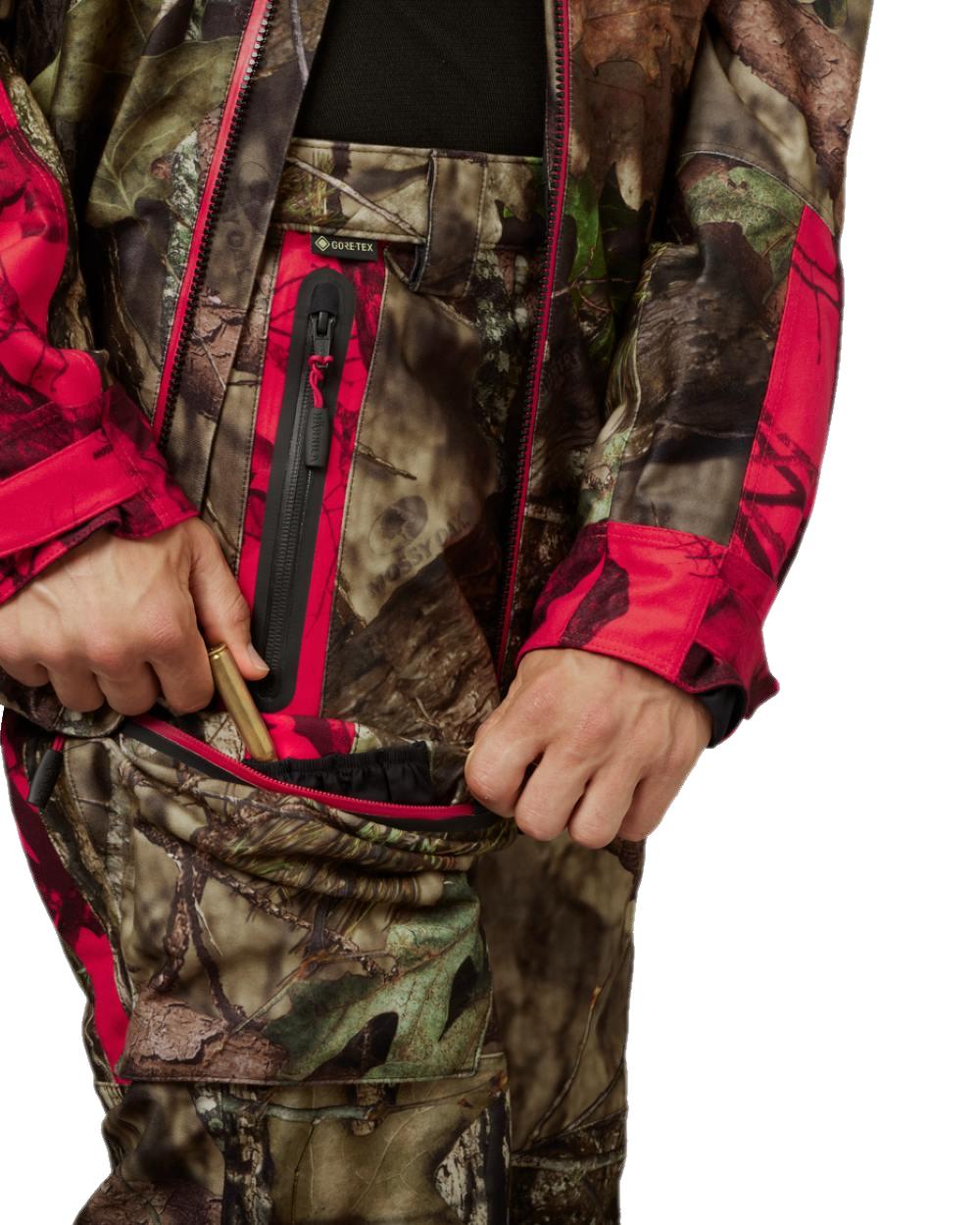 MossyOak Break-Up Country MossyOak Red Coloured Harkila Moose Hunter 2.0 GTX Trousers on white background #colour_mossyoak-break-up-country-mossyoak-red