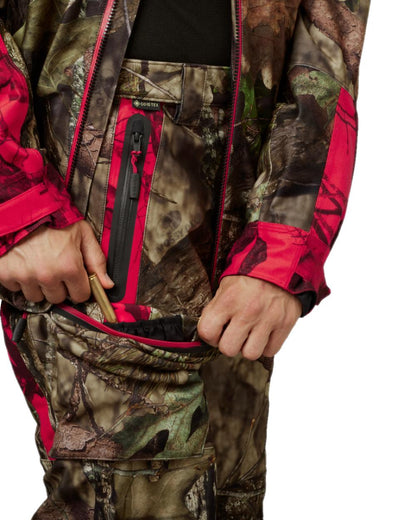 MossyOak Break-Up Country MossyOak Red Coloured Harkila Moose Hunter 2.0 GTX Trousers on white background #colour_mossyoak-break-up-country-mossyoak-red