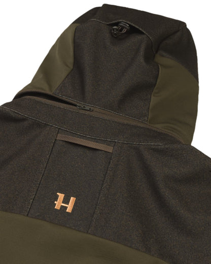 Willow Green Coloured Harkila Mountain Hunter Hybrid Jacket on white background #colour_willow-green