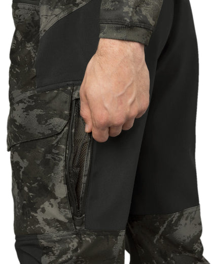 AXIS Black Black Coloured Harkila NOCTYX Camo Silent Trousers on white background #colour_axis-black-black