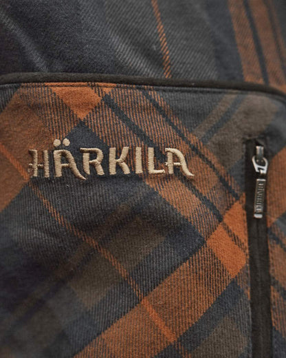 Bombay Brown Coloured Harkila Pajala Check Shirt on outdoor background #colour_bombay-brown