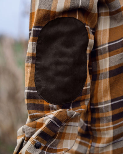 Cornstalk Check coloured Harkila Pajala Check Shirt on field background #colour_cornstalk-check