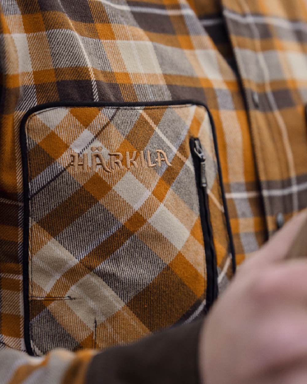 Cornstalk Check coloured Harkila Pajala Check Shirt on field background #colour_cornstalk-check
