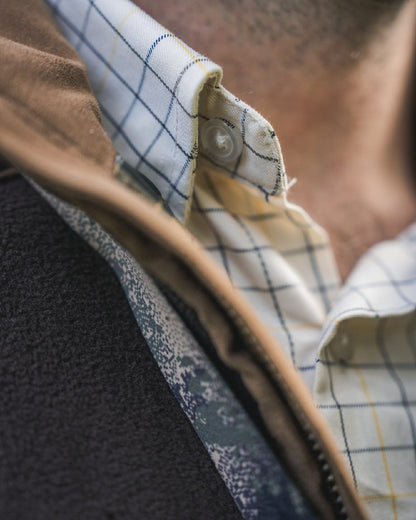 Grape Leaf Coloured Harkila Portfield Long Sleeve Shirt on blurry background #colour_grape-leaf