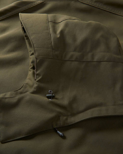 Willow Green Coloured Harkila Pro Hunter Endure Jacket on outdoor background #colour_willow-green