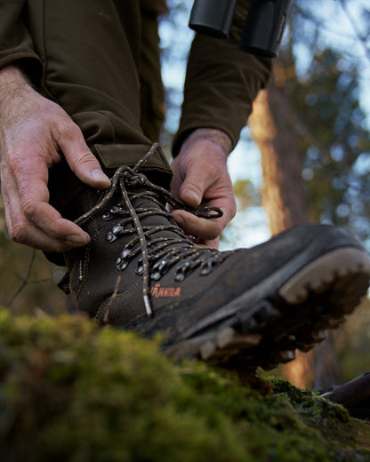 Shadow Brown Coloured Harkila Pro Hunter Light Mid GTX Boots on outdoor background #colour_shadow-brown