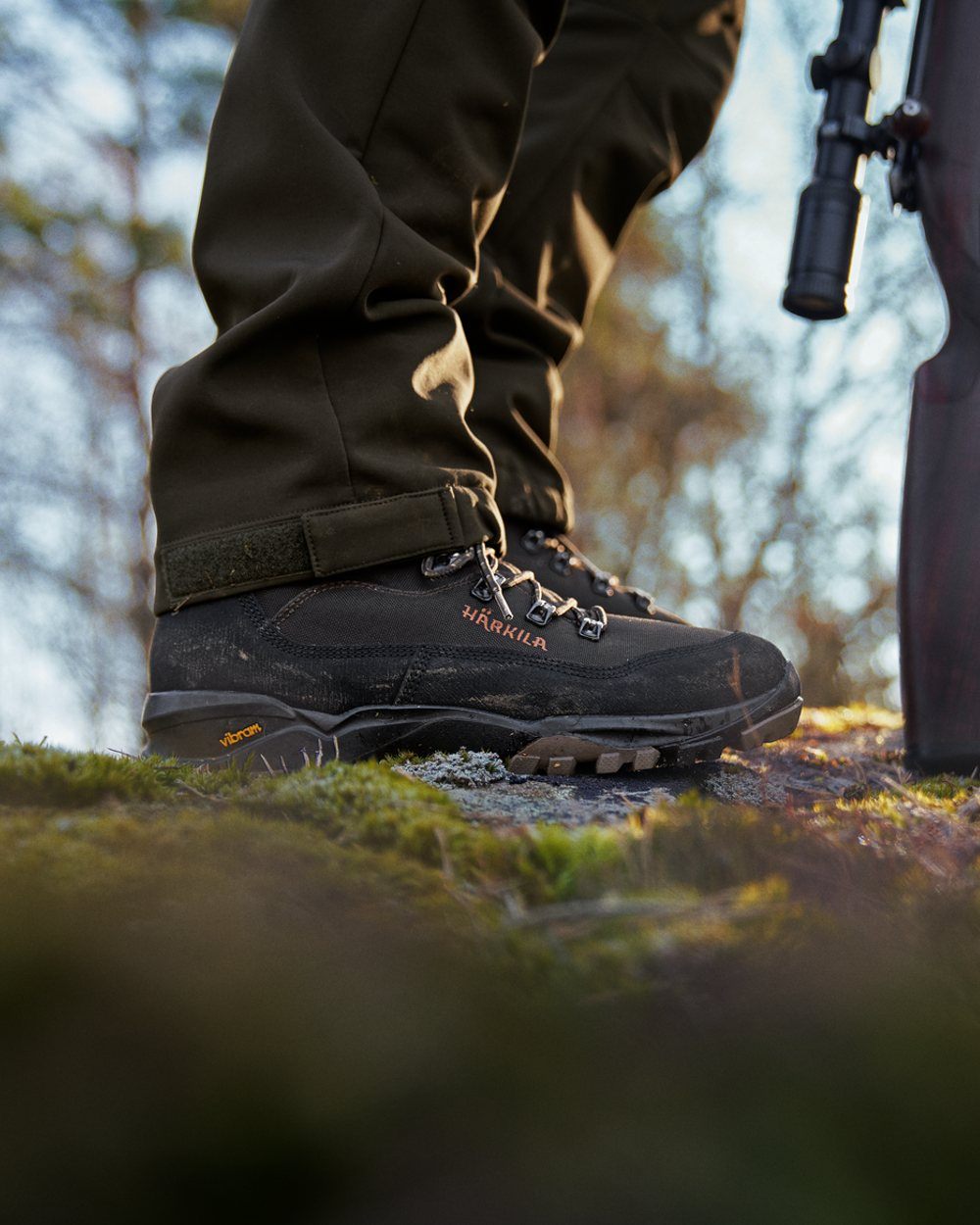 Shadow Brown Coloured Harkila Pro Hunter Light Mid GTX Boots on outdoor background #colour_shadow-brown