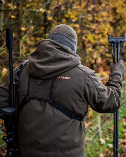 Willow Green Coloured Harkila Pro Hunter Move 2.0 GTX Jacket on outdoor background #colour_willow-green